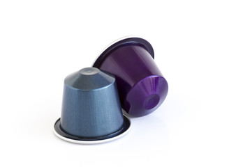 Italian coffee espresso capsules or coffee pods on white isolate