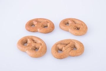 Naklejka premium Cookie or Biscuit pretzel on a background.
