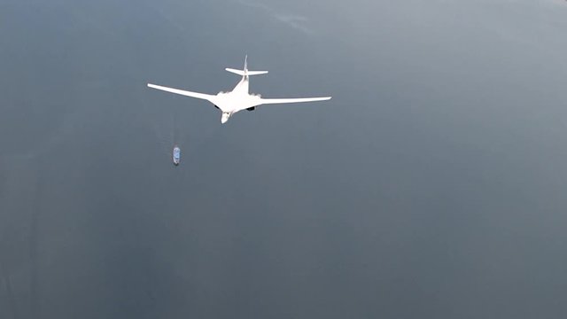 Russian bomber Tu-160 over the ship