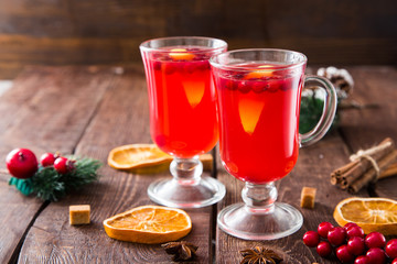 Christmas card. hot spicy Christmas drink of cranberry and spice