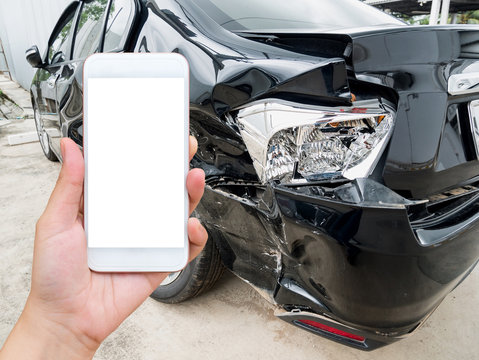 female hold mobile smartphone with car accident