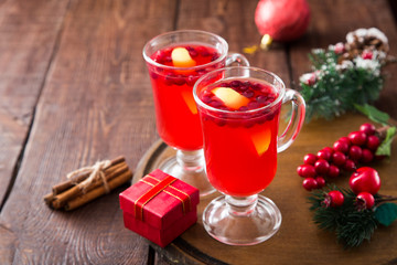 Christmas card. hot spicy Christmas drink of cranberry and spice