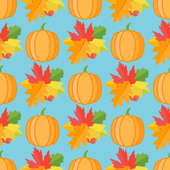 Seamless pattern with pumpkins and autumn leaves on blue background. Vector texture.