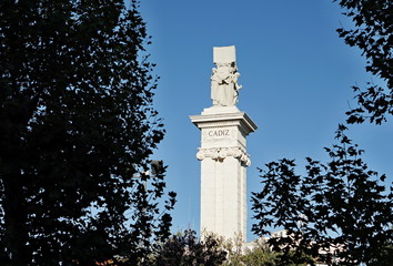 White symbolic column in Cadiz, southern Spain as a memorial and symbol of Spanish freedom