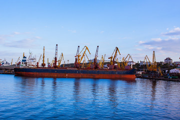 cargo ship loading in sea port