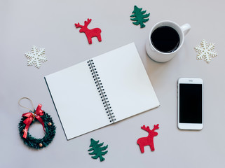 Creative flat lay of christmas craft and blank notebook mock up