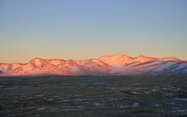 Fototapeta na wymiar Mountains at sunset in pink color
