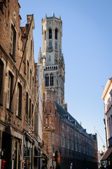 Fototapeta na wymiar Brugges Bell Tower at market place