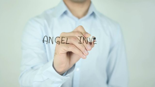 Angel Investor, Man Writing on Screen