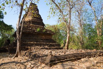 The ruins of ancient chedi Wat Khao Suvankhiri, sunny day. Si Satchanalai, Thailand