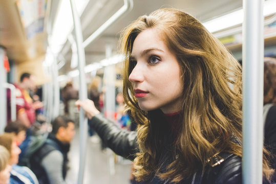 Young Beautiful Caucasian Woman Commuter In The Subway - Commuting, Journey, Underground Concept