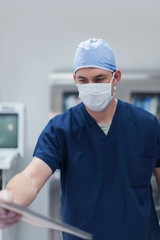 Working Doctor candid surgery stock photo
