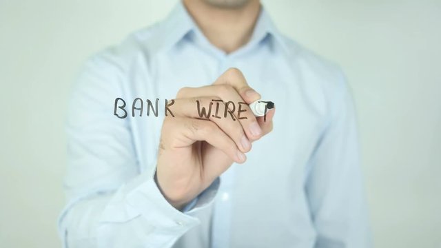 Bank Wire Transfer, Man Writing on Screen