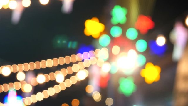 Blurred Light wheel at night market bangkok thailand .Background
