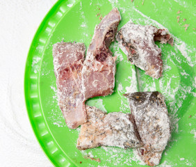 fish pieces in flour