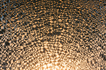 Glass covered with frost on a colored background
