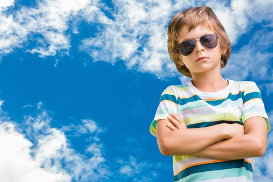 Composite image of child with sun glasses 
