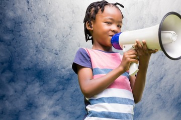 Composite image of child with megaphone