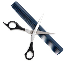 Comb with scissors on a white background