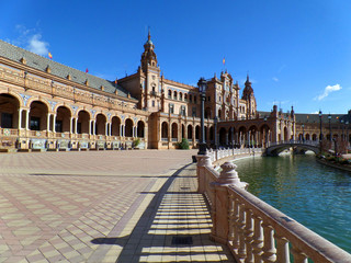 Stunning architecture against the blue sky, Plaza de Espana in Seville of Spain 