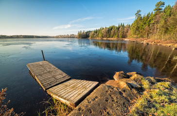 November landscape over natural Swedish lake