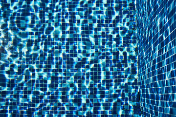 Blue swimming pool tile background