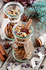 Granola with chocolate chips and spices.Christmas edible gift ideas.Healthy breakfast to go. Selective focus