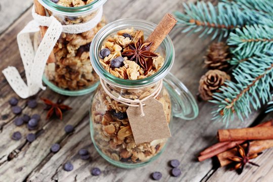 Granola with chocolate chips and spices.Christmas edible gift ideas.Healthy breakfast to go. Selective focus