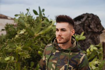 Attractive guy with military jacket