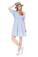 Fashion photo of young magnificent woman wearing fashionable summer clothes