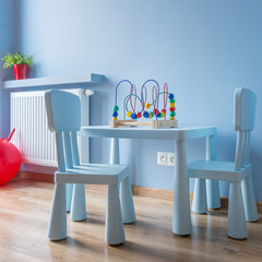 Small blue table and chairs