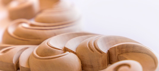 Obraz premium Wood processing. Joinery work. wood carving. the carving element. close up. small depth of field. use as background