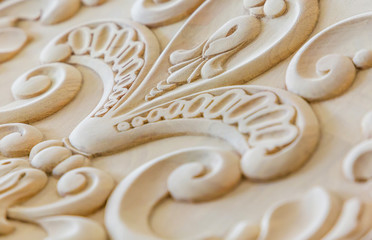 Wood processing. Joinery work. wood carving. the carving element. close up. small depth of field. use as background