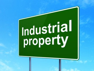 Law concept: Industrial Property on road sign background
