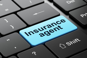 Insurance concept: Insurance Agent on computer keyboard background