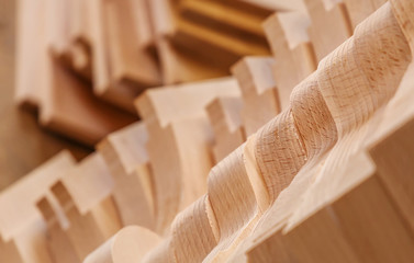 Wood processing. Joinery work. wooden furniture. Wood timber construction material for background and texture. details wood production. composition wood products. small depth of field