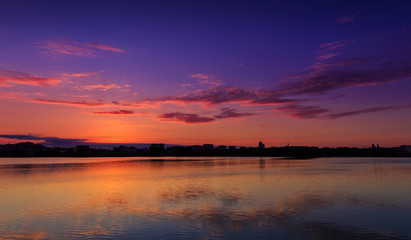 Obraz premium fantastic landscape, colorful sky over the lake. majestic sunrise. use as background. color in nature. beautiful in nature. series . creative images.