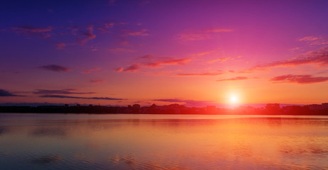 Fototapeta na wymiar fantastic landscape, multicolor sky over the lake. majestic sunrise. use as background. color in nature. beautiful in nature. creative images.