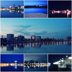 Fototapeta na wymiar Midtown Astrakhan skyline at dusk panorama over Volga River in Night.