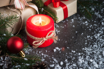 Fototapeta na wymiar Christmas candle present and decorations