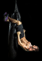 Abs training on punching bag