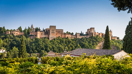 Fototapeta na wymiar Famous Alhambra Royal Palace (UNESCO heritage) from the view point in front of the Alhambra hill