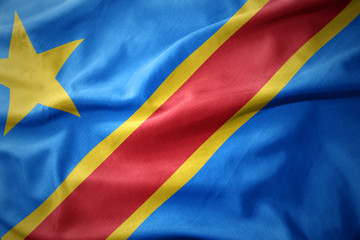 waving colorful flag of democratic republic of the congo.