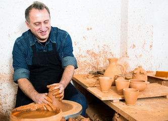 Male master among the pottery