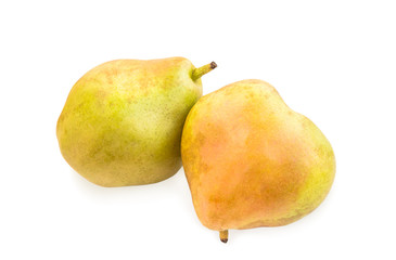 Two blushful ripe pears with spotty pear skin on white.