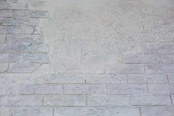gray texture of plaster and brick
