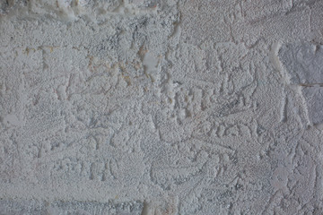 gray texture of plaster and brick