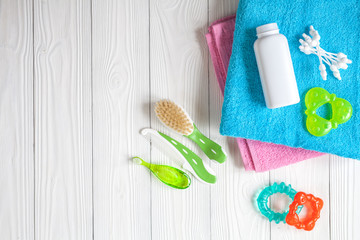 baby accessories for bath on wooden background