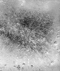 Micro air bubbles in the ice frozen during their movement to the water surface. 1 : 1 macro lens...