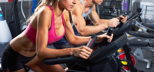 people on elliptical trainer